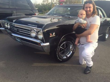 Hey guys, here is a picture of me and my Dad and his cool car. A 1967 Chevelle Super Sport!
